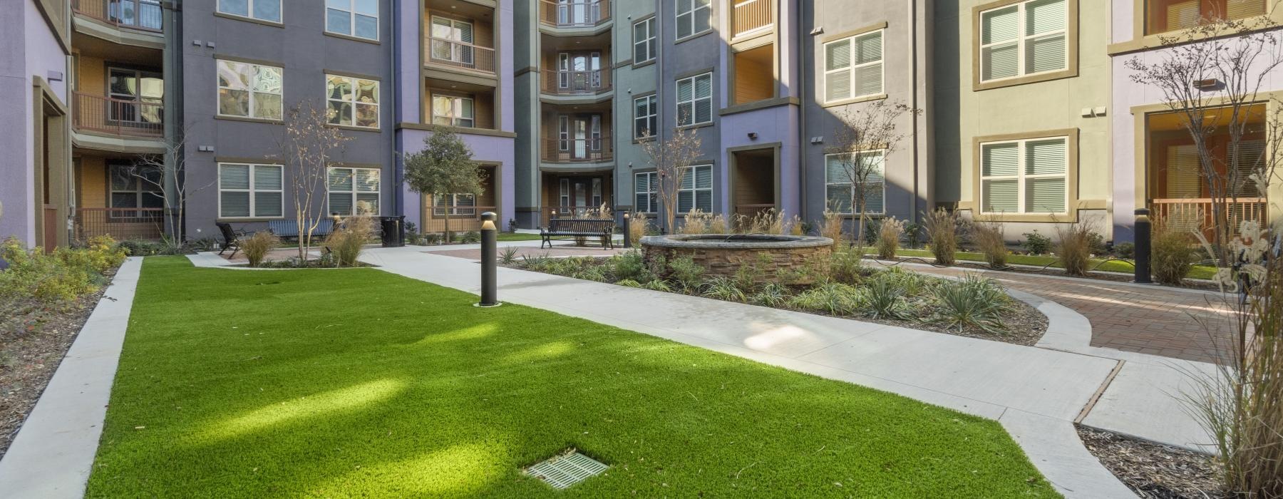 a building with a lawn in front